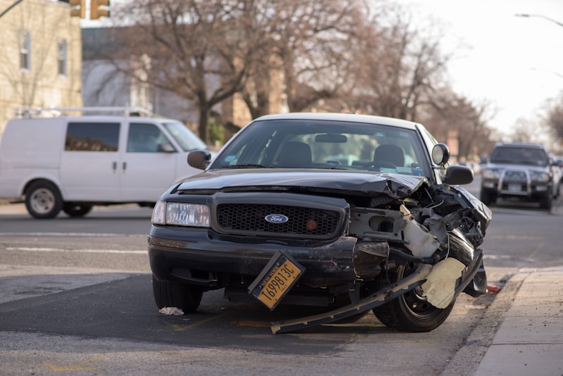 Damaged car after a road accident — the consequence of traffic violations